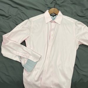 Pink long sleeved button down from Ted Baker. Black and white patterned accents